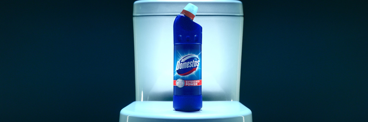 Domestos bottle on a toilet 